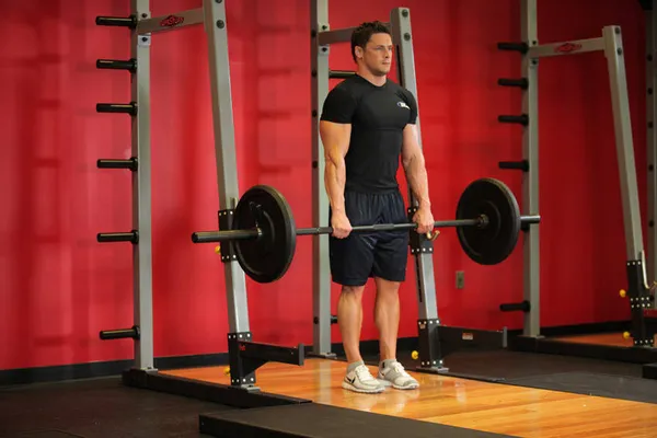 Shrugs — position de départ