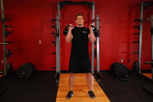 Thruster (phase squat) — position de départ